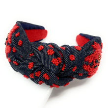 Load image into Gallery viewer, Handmade denim headband featuring vibrant red crab beadwork, twisted knot detail, and playful coastal-inspired embroidery.