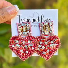 Load image into Gallery viewer,  hearts Beaded Earrings, red Heart Earrings, Valentines Day Earrings, Valentines Beaded Earrings, Valentines Heart earrings, red gold earrings, valentine’s day beaded earrings, hearts beaded earrings, valentines beaded earrings, Hearts earrings, Valentine’s day earrings, tween girls accessories, Valentine’s day accessories, Best friend gifts, Best selling items, love accessories, boho earrings, custom earrings, unique earrings, unique gifts, handmade gifts, heart chocolate box jeweled earrings
