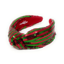 Load image into Gallery viewer, A vibrant headband adorned with alternating red and green sequins, forming a knot at the center. The design creates a festive, cheerful vibe.