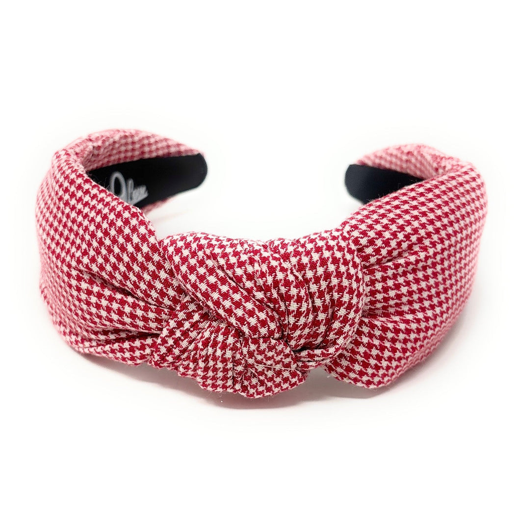 Red and white checkered headband on a white background