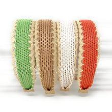Load image into Gallery viewer, Four knitted lace headbands in green, tan, white, and rust orange, arranged side-by-side on a white background.