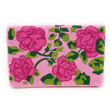 Load image into Gallery viewer, A beaded clutch purse with a pink background and floral patterns, featuring prominent pink roses.