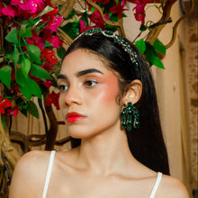 Load image into Gallery viewer, Elegant fashion portrait featuring a crystal green headband and bold emerald drop earrings.
