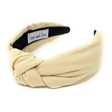 Load image into Gallery viewer, Beige linen knotted headband featuring a chic front twist design and a soft neutral tone, perfect for everyday styling.
