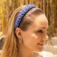 Load image into Gallery viewer, Statement blue jeweled headband featuring faceted crystals and silver accents, styled with sleek hair.