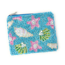 Load image into Gallery viewer, Blue beaded pouch with starfish, shells, and coral designs on a white background