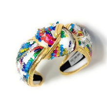 Load image into Gallery viewer, Gold padded headband adorned with colorful sequins, displaying a vibrant, playful design. 