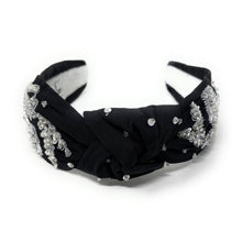 Load image into Gallery viewer, A black headband adorned with intricate silver floral embroidery and shimmering gemstones, conveying elegance and luxury.