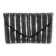 Load image into Gallery viewer, Silver and black sequined clutch with vertical stripes. It features a triangular flap, exuding a glamorous, elegant vibe.