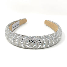 Load image into Gallery viewer, Elegant silver headband adorned with sparkling, intricate patterns and rhinestones, reflecting light. 