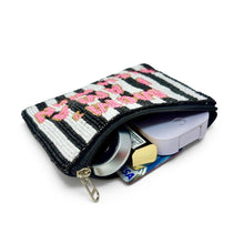 Load image into Gallery viewer, A small zippered wallet or card holder with a black and white striped pattern and pink lettering, shown open with cards and small items inside on a white background.