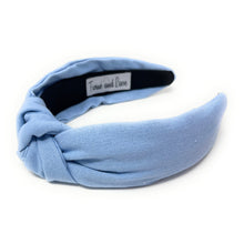 Load image into Gallery viewer, Wide pastel blue headband with a stylish front knot and lightweight woven fabric finish.