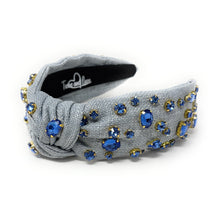 Load image into Gallery viewer, Elegant gray headband adorned with blue and gold rhinestones.