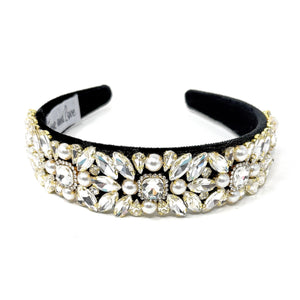 Luxurious black headband adorned with sparkling crystals and pearls in floral patterns, conveying elegance and glamour