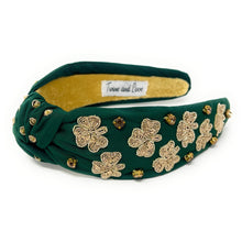 Load image into Gallery viewer, headbands for women, green knotted headband, headband style, top knot headband, green top knot headband, lucky charm headband, lucky charm hair band, green knot headband, top knotted headband, St Patrick’s headband, handmade headbands, top knotted headband, hand bead knotted headband, Clover leaf hair band for women, Hand bead St. Patrick’s headband, statement headbands, embellished headband, chic headband, clover leaf knot headband, st paddy’s headband, green hair accessories, shamrock headband