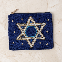 Load image into Gallery viewer, Navy blue hand-beaded pouch with an intricate Star of David design, white pearl beads, gold accents, and blue details.