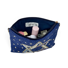 Load image into Gallery viewer, Open navy blue beaded pouch showing its spacious fabric-lined interior and zipper closure.