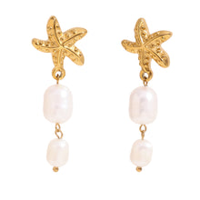 Load image into Gallery viewer, Gold starfish earrings with pearl drops on a white background