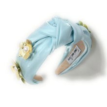 Load image into Gallery viewer, A stylish headband for women, featuring a soft blue color and floral details.