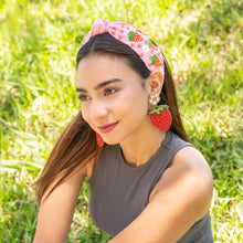 Load image into Gallery viewer, Chic summer style showcasing strawberry-inspired statement earrings and a pink fruit embroidered knot headband.