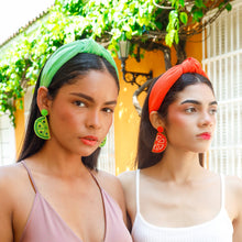 Load image into Gallery viewer, Fashion models wearing vibrant fruit-inspired earrings and matching headbands