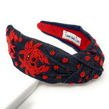 Load image into Gallery viewer, Coastal-themed embellished headband featuring red beaded crab motifs on dark denim fabric with a stylish twisted design.