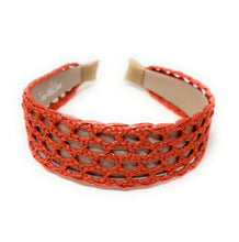 Load image into Gallery viewer, Wide coral orange statement headband showcasing intricate basket-weave detailing and airy openwork craftsmanship.