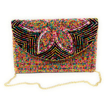Load image into Gallery viewer, Artisan-crafted beaded handbag with a striking flower centerpiece and rainbow-inspired geometric detailing.