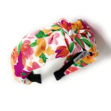 Load image into Gallery viewer, colorful floral print headband paired with bold yellow flower statement earrings outdoors.