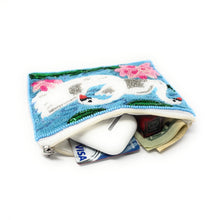 Load image into Gallery viewer, Hand beaded pouch with two white swans, pink flowers, and green leaves on a blue background. 
