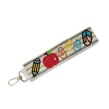 Load image into Gallery viewer, Keychain with colorful design on a white background