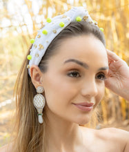 Load image into Gallery viewer, Woman wearing a decorative headband and beautiful jeweled tennis earrings