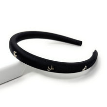 Load image into Gallery viewer, Black headband with small bows decorative charms on a white background