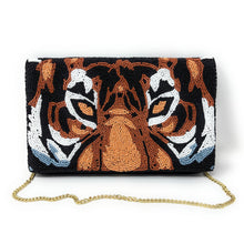 Load image into Gallery viewer, Black beaded clutch purse with a detailed tiger face motif, handcrafted with vibrant orange and white accents.