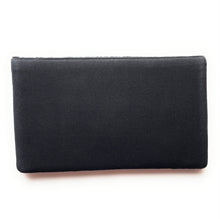 Load image into Gallery viewer, Black beaded evening clutch with a fierce tiger face motif and striking amber eyes