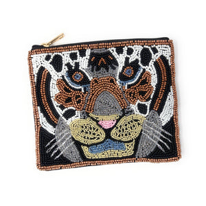 Beaded pouch depicting a tiger's face, made with intricate brown, black, white, and blue beads. The design is vibrant and expressive, with a gold zipper.