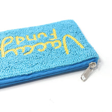 Load image into Gallery viewer, Handmade beaded pouch with bright blue background and yellow “Vacay Fund” design.