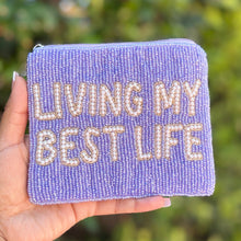 Load image into Gallery viewer, Purple hand-beaded zip wallet featuring inspirational typography