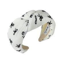 Load image into Gallery viewer, Trendy headband with a unique black and white design.