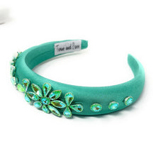 Load image into Gallery viewer, Turquoise headband with decorative elements on a white background