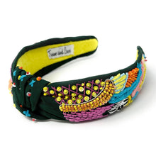 Load image into Gallery viewer, Hand-beaded knot headband with colorful embroidery, sequins, and playful mixed textures on a dark green fabric base by Twine and Love.