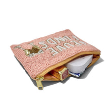 Load image into Gallery viewer, A pink beaded zippered pouch with gold zipper and trim, featuring white beaded text that reads 'VEUVE FUNDS'. 