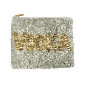 Silver pouch with 'VODKA' in gold beads on a white background
