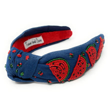 Load image into Gallery viewer, Playful blue denim headband featuring red and green watermelon bead embroidery with a twisted knot front.