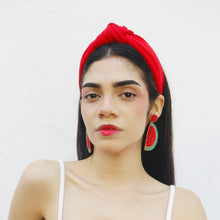 Load image into Gallery viewer, Fashion portrait with colorful fruit inspired earrings and bold red hair accessory.