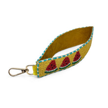 Load image into Gallery viewer, A mustard yellow fabric pouch with turquoise and white beaded trim and embroidered watermelon designs, featuring a gold-tone metal lobster clasp, on a white background.