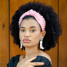 Load image into Gallery viewer, Fashion portrait featuring a pink pearl-studded headband paired with western-inspired cowboy boot statement earrings and a black dress.