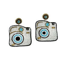 Load image into Gallery viewer, White beaded camera statement earrings with blue lens detail