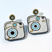 Load image into Gallery viewer, White beaded camera statement earrings with blue lens detail