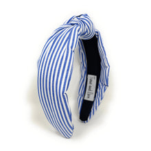 Load image into Gallery viewer, Blue and white striped headband with a knotted detail in the center, set against a plain white background, conveying a trendy, nautical style.